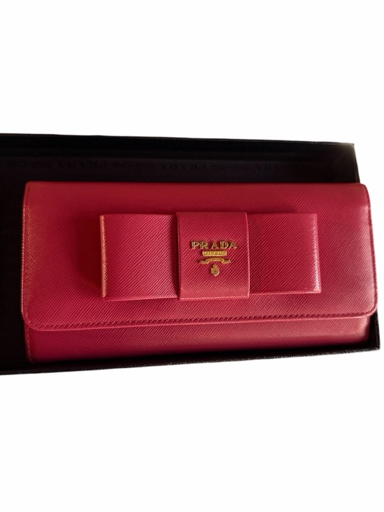Prada Handbags - Prada Fucsia Saffiano Leather Bow Continental Wallet
